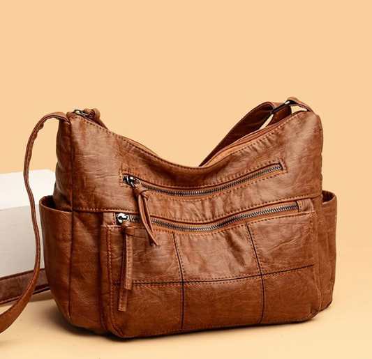 Unleash Your Adventurous Side with this Faux Leather Shoulder Bag!